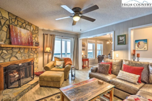 the living room in a condo in Blowing Rock. it is very spacious and comfortable, with a fireplace on the left hand side